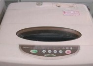 海尔洗衣机小神童E1故障代码解析（排水超时导致的故障原因及处理方法）