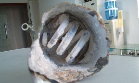 如何解决饮水机内部积水垢问题（清洁水垢）  第1张